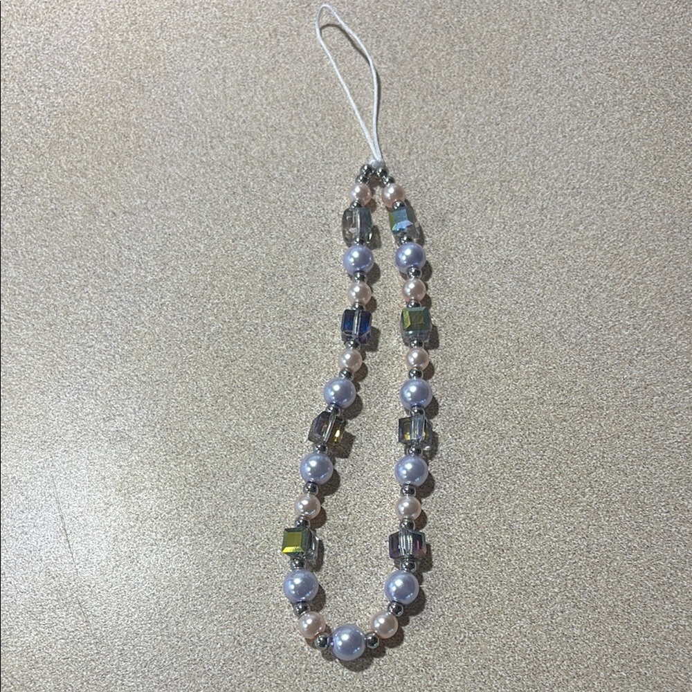 Elegant Beaded Electronics Accessory